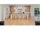 Spacious kitchen showcases a large island with seating, modern appliances, and ample cabinet space at 490 Mount Paran Rd, Atlanta, GA 30327