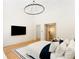 Bright main bedroom with high ceilings, a large window, and a comfortable seating area at 490 Mount Paran Rd, Atlanta, GA 30327