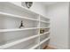 Pantry shelving with storage space, and neutral decor at 490 Mount Paran Rd, Atlanta, GA 30327