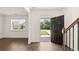 Bright entryway featuring hardwood floors, and a front door with outside view at 628 Kimberwick Dr, Locust Grove, GA 30248