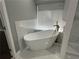 Modern bathroom featuring a soaking tub and sleek fixtures at 1341 Beeblossom Trl, Lawrenceville, GA 30044
