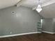 Spacious living room featuring hardwood floors, vaulted ceilings, and a decorative chandelier at 1341 Beeblossom Trl, Lawrenceville, GA 30044