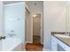 Bright bathroom features walk-in shower, soaking tub and walk-in closet at 4915 Truitt Ln, Decatur, GA 30035