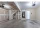 Spacious unfinished garage with a water heater and ample room for storage and parking at 4915 Truitt Ln, Decatur, GA 30035
