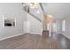 Spacious living room with tall ceilings, and stairs leading to the second floor at 4915 Truitt Ln, Decatur, GA 30035