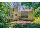 Backyard view featuring a wooden deck and lush green landscaping, perfect for outdoor enjoyment at 1076 Plantation Se Blvd, Conyers, GA 30094
