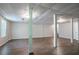 Finished basement featuring laminate flooring, neutral paint colors, storage space, and recessed lighting at 1076 Plantation Se Blvd, Conyers, GA 30094