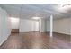 Large finished basement with laminate flooring, plenty of room for recreation, and storage at 1076 Plantation Se Blvd, Conyers, GA 30094