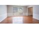 Well-lit dining room with ample space and tasteful wainscoting adds charm and character at 1076 Plantation Se Blvd, Conyers, GA 30094