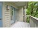 Outdoor balcony offers a private space to enjoy the surrounding greenery and natural light at 205 Tuxworth Cir # 205, Decatur, GA 30033