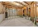 Unfinished basement with exposed framing, concrete floor, and electrical wiring at 4625 Cold Spring Court, Cumming, GA 30041