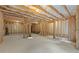 Unfinished basement with exposed framing, concrete floor, and electrical wiring at 4625 Cold Spring Court, Cumming, GA 30041