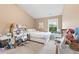 Bedroom with a window, carpet, and a desk with shelves and accessories at 4625 Cold Spring Court, Cumming, GA 30041