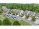 Picturesque street view of modern homes, lush landscaping, and a peaceful residential setting at 4625 Cold Spring Court, Cumming, GA 30041