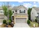 Charming two-story home features a stone facade and attached two-car garage at 4625 Cold Spring Court, Cumming, GA 30041
