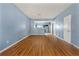 Cozy living room with open view of kitchen with stainless steel appliances at 2465 Brianna Dr, Hampton, GA 30228