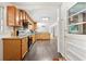 Well-equipped kitchen with wood cabinets, granite countertops, and modern appliances at 4590 Sims Ct, Tucker, GA 30084