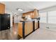 Functional kitchen featuring a black refrigerator, granite counters and natural light at 4590 Sims Ct, Tucker, GA 30084