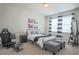 Comfortable bedroom with a racing car theme, complete with modern furniture and stylish decor at 688 Saffron Blvd, Lawrenceville, GA 30045