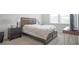 Inviting bedroom with a comfortable bed, stylish nightstands, and plenty of natural light, creating a relaxing retreat at 688 Saffron Blvd, Lawrenceville, GA 30045