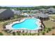 Large community pool with plenty of lounge chairs for relaxing in the sun at 688 Saffron Blvd, Lawrenceville, GA 30045