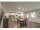 Dining area with hardwood floors, stainless steel appliances, open floor plan to kitchen and lots of light at 688 Saffron Blvd, Lawrenceville, GA 30045