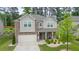 Charming two-story home with brick accents and a well-maintained landscaped front yard at 688 Saffron Blvd, Lawrenceville, GA 30045
