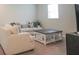 Cozy living room featuring plush sofas, decorative pillows, and a stylish coffee table, perfect for entertaining at 688 Saffron Blvd, Lawrenceville, GA 30045