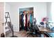 Bedroom with a closet, workspace, and fan offering ample room for storage and comfort at 7270 Williamsburg Dr, Riverdale, GA 30274