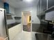 Well-lit kitchen features modern appliances, ample storage, and sleek countertops at 3079 Colonial Way # J, Atlanta, GA 30341