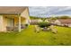 Inviting backyard with patio furniture and fire pit for outdoor gatherings and relaxation at 3531 Brookstone Way, Union City, GA 30291