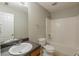 Bathroom featuring vanity with sink, toilet, and bathtub with shower head at 3531 Brookstone Way, Union City, GA 30291
