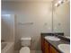 Well-lit bathroom featuring double sinks, a large mirror, and a shower-tub combo at 3531 Brookstone Way, Union City, GA 30291