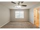 Bedroom with a ceiling fan and a window providing natural light at 3531 Brookstone Way, Union City, GA 30291