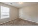 Well-lit bedroom offering neutral walls, plush carpeting, and a window for natural light at 3531 Brookstone Way, Union City, GA 30291