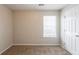 Bright bedroom featuring soft carpet, neutral paint, and a window to let the light in at 3531 Brookstone Way, Union City, GA 30291