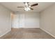 Bedroom with carpet, a ceiling fan, and windows that provide natural light at 3531 Brookstone Way, Union City, GA 30291