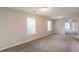 Spacious room with neutral tones, ample natural light, and versatile layout options at 3531 Brookstone Way, Union City, GA 30291