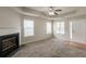 Spacious living room with new carpeting, a gas fireplace, a ceiling fan, and natural light at 3531 Brookstone Way, Union City, GA 30291