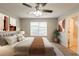 A beautifully decorated bedroom with ensuite bathroom, a large bed, and stylish decor at 3531 Brookstone Way, Union City, GA 30291