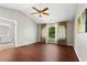 Vaulted ceiling in this bedroom filled with natural light and hardwood flooring at 5010 Foxberry Ln, Roswell, GA 30075