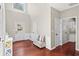Spacious foyer with hardwood floors, a high ceiling, and a view of the front entrance and interior doors at 5010 Foxberry Ln, Roswell, GA 30075