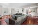 Spacious living room featuring hardwood floors and lots of natural light at 5010 Foxberry Ln, Roswell, GA 30075