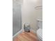Bathroom with a walk-in shower, neutral walls, and tile flooring providing a clean and refreshing space at 142 Old Hampton Way, Hampton, GA 30228