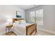 Cozy bedroom with natural light, a comfortable bed, and tasteful decor for a relaxing atmosphere at 205 Kestrel Cir, Covington, GA 30014