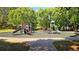 Well-equipped community playground featuring multiple slides, climbing structures, and a soft, safe play surface at 205 Kestrel Cir, Covington, GA 30014