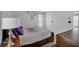 Cozy bedroom featuring a neutral color palette, comfortable queen-size bed, and ample natural light at 21 Collins Dr, Douglasville, GA 30134