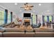 Spacious living room with hardwood floors, a fireplace, and an open layout perfect for entertaining at 21 Collins Dr, Douglasville, GA 30134