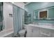 Bathroom featuring a modern vanity, toilet, and shower-tub combo with stylish tile work at 3186 Sail Winds Nw Dr, Acworth, GA 30101