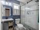 Updated bathroom with tiled walk-in shower and modern vanity at 3186 Sail Winds Nw Dr, Acworth, GA 30101